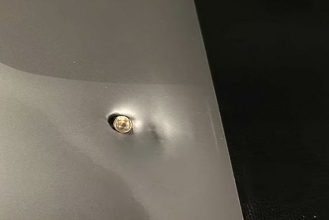 中国商人巴西遭抢劫 电脑挡下一枪 幸运逃过一劫