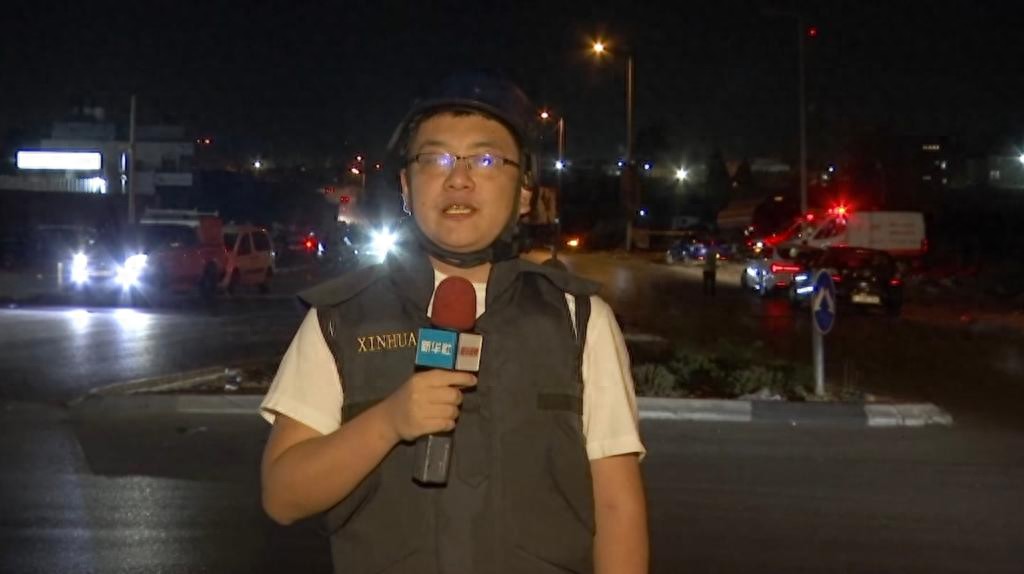 新华社战地记者_战火中的中国记者_新华社战地记者