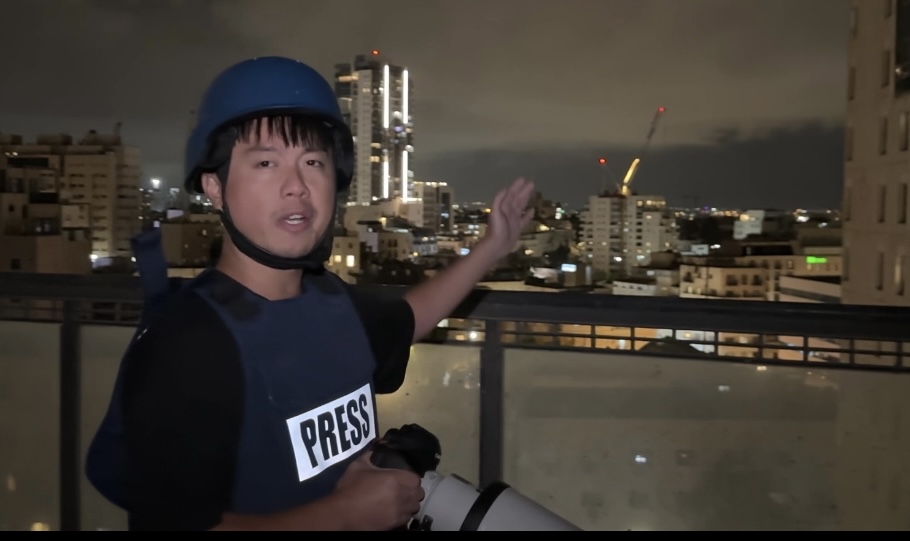 新闻摄影展经典瞬间_摄影记者工作照故事_新华社战地记者