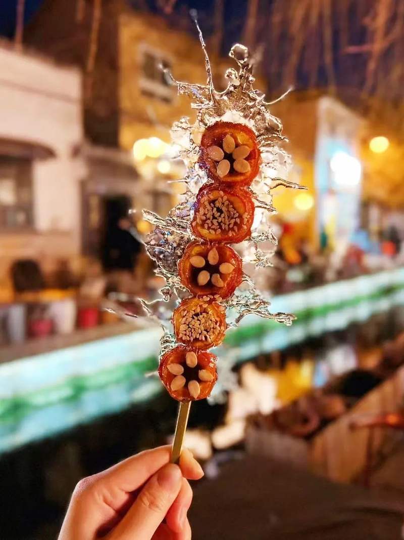 一米糖葫芦特色品种_奶皮子糖葫芦爆火_北方冰糖葫芦口感最佳