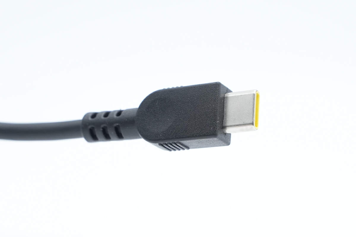 氮化镓电源适配器内部方案和用料_联想电脑电源线通用吗_联想原装100W氮化镓电源适配器拆解